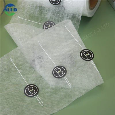 Toidukvaliteediga PLA mittekootud kangarull sildi ja niidiga kohvi- ja teepakkide jaoks